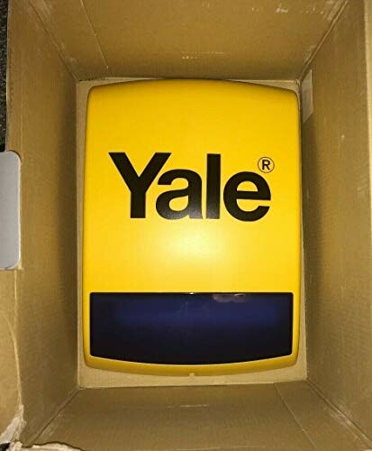 Yellow Yale alarm box in cardboard packaging